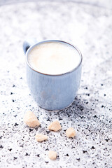 Cappuccino on bright background. Soft focus. Copy space