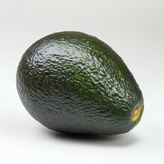Fresh whole avocado with a dark green textured skin on a neutral background. A nutritious and healthy fruit rich in vitamins and healthy fats, perfect for diet and wellness concepts.