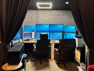 Showing an organized workspace with multiple monitors