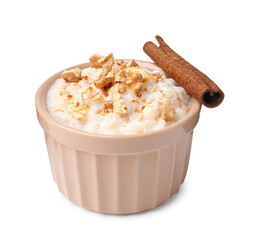 Tasty rice pudding with walnuts and cinnamon isolated on white