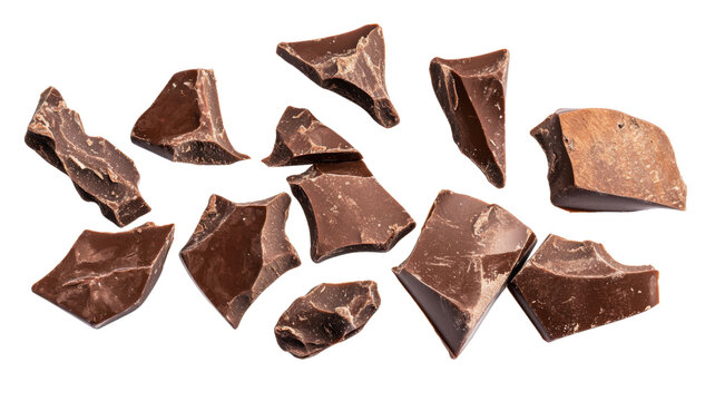 Delicious chocolate chunks falling on transparent background