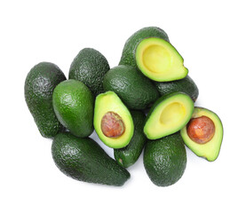 Many whole and cut avocados isolated on white, top view