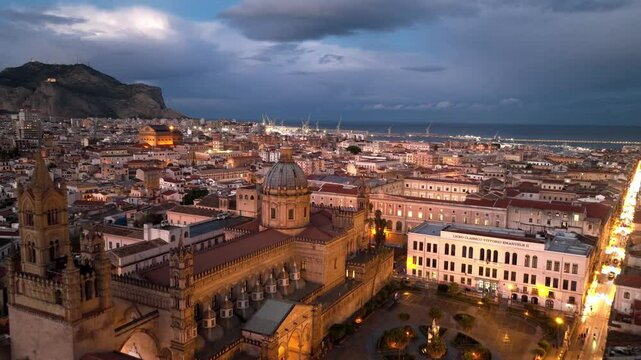 Palermo at night aerial view, capital of Sicily drone shot, Italian tourism, travel in Sicily, southern Italy, town of Palermo with night illumination 