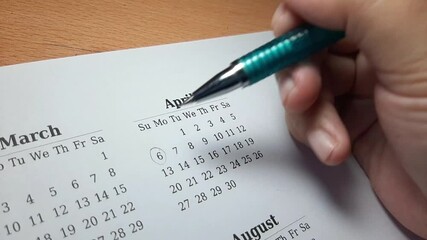 marking April 6 date on the calendar