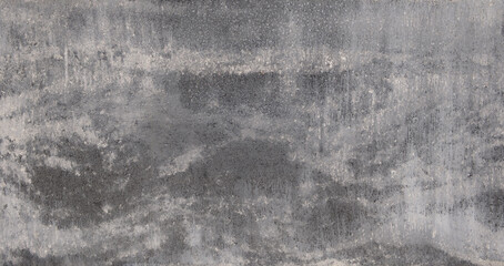 Gray  wall with rough texture as a background for a template or banner. wall is made of stone and has a gray color