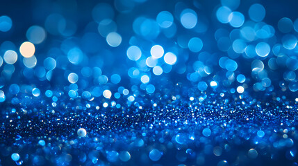 Sapphire glitter bokeh background. Unfocused shimmer royal blue sparkle. Crystal droplets wallpaper