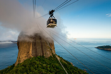 Fototapeta premium Sugarloaf Mountain Under Cloud with the Cable Car in Rio de Janeiro, Brazil