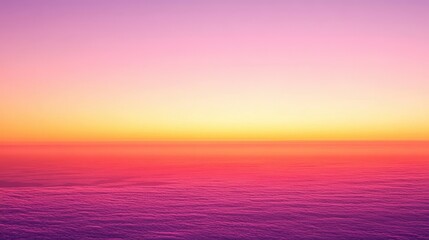 Obraz premium Vibrant sunset hues blend from pink and orange to deep purple, creating a breathtakingly peaceful sky