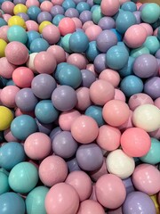 a collection of small, colorful plastic balls