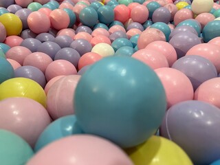a collection of small, colorful plastic balls