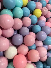 a collection of small, colorful plastic balls