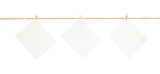 note paper hanging on clothes pins