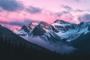 Obraz premium Mountain Range at Sunset With Vibrant Clouds in Shades of Pink and Purple Over Snow-Capped Peaks