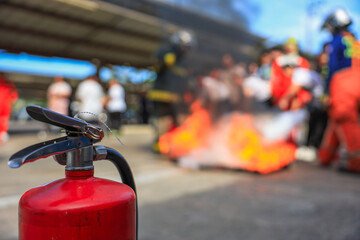 Company employees are undergoing basic fire extinguishing training, fire extinguisher use, safety...