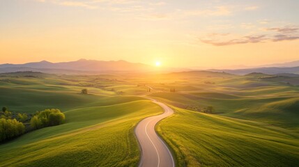Peaceful landscape at sunset, winding road through lush green hills, warm golden light illuminating the serene environment.