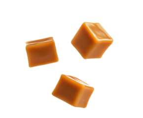 Caramel cubes flying in air isolated on white background. Set of delicious caramel candies floating isolated on white background. caramel cubes. 
