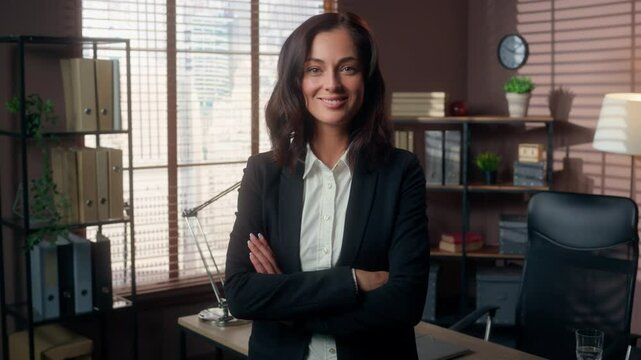Portrait confident Caucasian woman female girl businesswoman business office manager employer entrepreneur indoors company worker crossed hands folded arms lady looking at camera posing leader boss