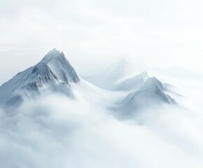 Obraz premium Snowy mountain peaks emerging from fog