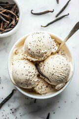 Fototapeta premium Vanilla bean ice cream scoops in a bowl