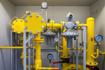 In the gas distribution industry, a gas pressure regulation and filtration system with yellow...