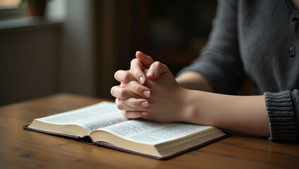 Women in Prayer: Seeking God's Blessings for a Better Life During Crisis - Holding Hands with the Bible on a Wooden Table, Believing in Goodness and Hope