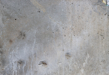 Surface of an old abandoned concrete wall.