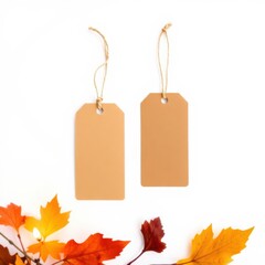 Two blank tags sit above autumn leaves, suggesting a fall sale or seasonal product promotion.