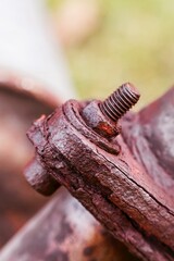 Close-up rusty bolt with grunge texture