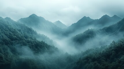 Panoramic View of Lush Mountain Range in Foggy Atmosphere with Green Hues