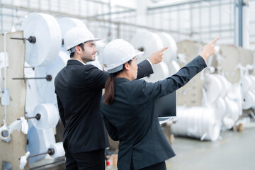 By integrating AI into the machinery of his industrial plant, the European male company owner...