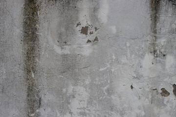 Texture of old peeling plaster on a wall.