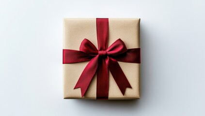Wrapped gift box with a red ribbon bow