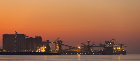 light up storage facility and tracks at twilight at Europoort, Rotterdam, Header Image