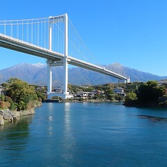 Fototapeta premium White bridge, mountain view, calm water, Japan