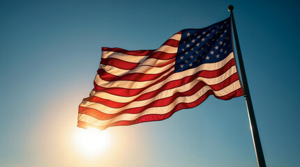 A Majestic American Flag Billowing Proudly In The Warm Golden Light Of A Setting Sun, A Symbol Of Freedom And National Pride Against A Clear Blue Sky