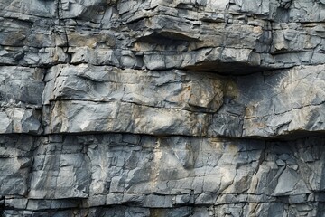 Magnificent natural rock formation displaying layers of sedimentary strata, creating a mesmerizing geological tapestry of textures and earthy tones