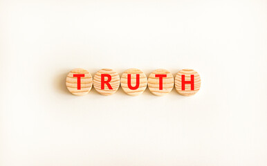Truth symbol. Concept word Truth on beautiful wooden circles. Beautiful white table white...