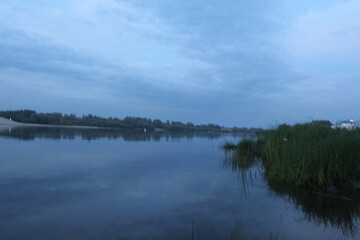 evening landscape sunset over river near shore