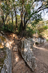 Old stone water canal, on Pont du Gard, ancient Roman aqueduct bridge in Gorges du Gardon, natural landscape designated Biosphere Reserve by UNESCO