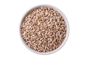 Peeled sunflower seeds in a bowl, an ingredient for making vegetarian food