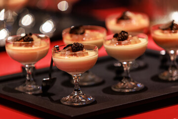 Elegant gourmet dessert served in delicate glassware