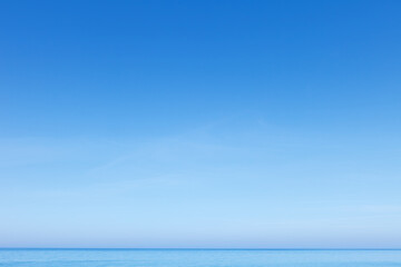 Clear blue sky over the sea. The horizon line