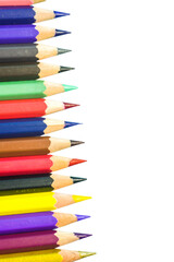 Colorful Pencils: A vibrant assortment of sharpened colored pencils are arranged in a neat row, creating a visually appealing pattern of creative tools ready for use.