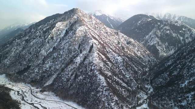 Talgar gorge. Tien Shan Mountains, Ile-Alatau Nature Park. Mountainous area with different vegetation. The view from the drone.