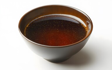 Dark Brown Liquid in Bowl, Golden Specks, Closeup