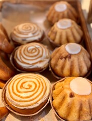 Delicious Mini Bundt Cakes with Whimsical Swirls and Luscious Icing for Every Occasion. A wonderfully tempting display of mini bundt cakes adorned with delightful swirl designs