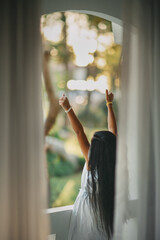 the girl pulls herself up on the terrace