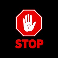 Obraz premium A red octagonal stop sign with a white hand symbol and the word 