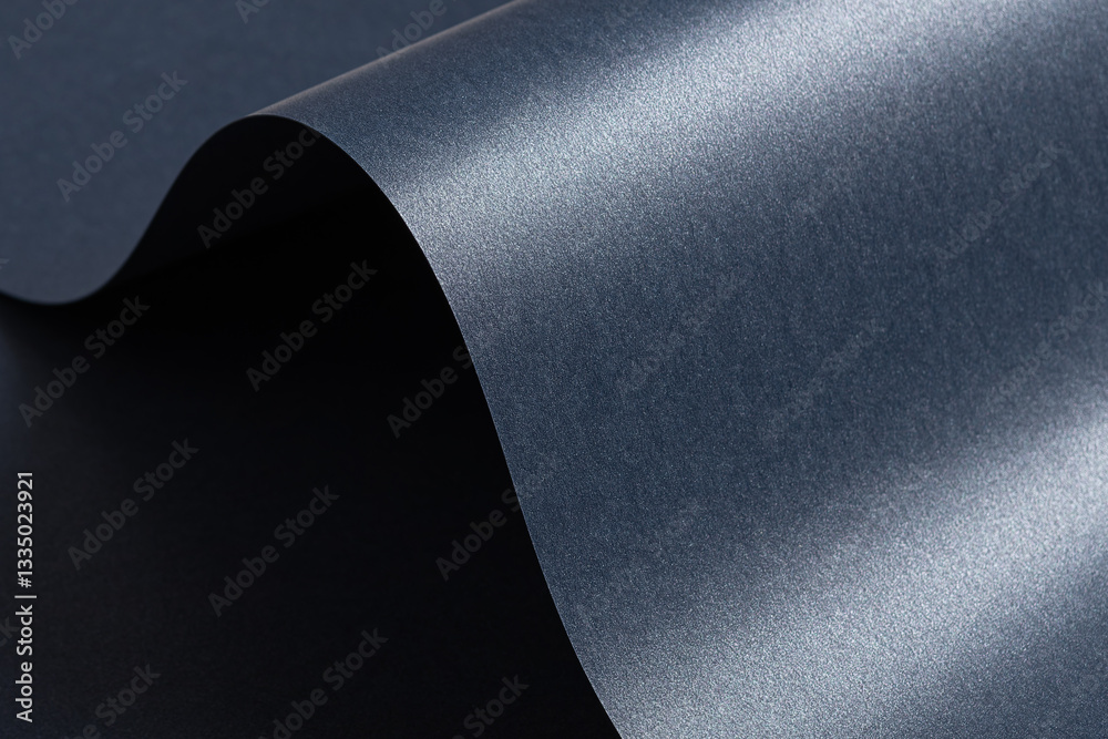 Poster Elegant blue paper background with a smooth texture and metallic shimmer. Dark, cool tones create a luxurious, modern design with reflective, glossy gradients and sleek wavy edges, perfect for premium