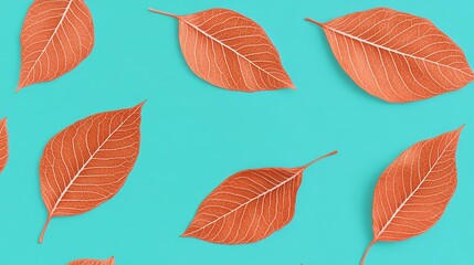 Fototapeta premium Vibrant Orange Leaves on Teal Background Autumnal Pattern Design